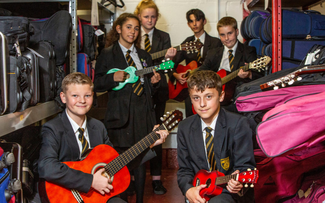 Hayle students visit ‘Aladdin’s cave’ of musical instruments
