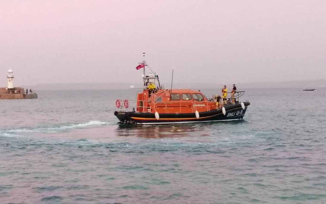 Lifeboat crew help passenger vessel taking on water